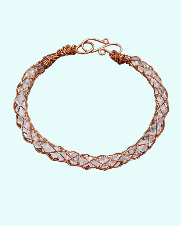  Handmade copper kumihimo bracelet with rose quartz beads visible through the hollow braid, by 8th by MOC Designs
